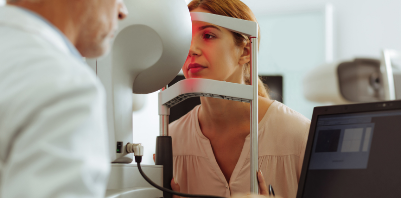 Young female patient receiving an eye text